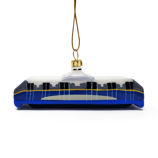 Hand painted glass Christmas ornament in the shape of a SeaBus ferry, with blue livery and gold accents, suspended by a gold loop.